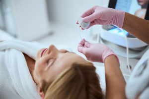 Woman preparing for a Skin Needling session | Featured Image for the Blog, New Scar Removal Techniques to Give You More Confidence from Brisbane Cosmetic Clinic