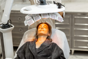 Woman receiving light therapy | Featured Image for Infrared Light Therapy Post Cosmetic Surgery | Blog
